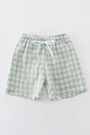 Green seersucker gingham boy swim trunks
